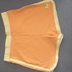 Girls athletic works shorts size 5t. Orange and yellow